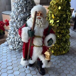 Festive Santa Claus Figurine with Lantern 11” H x 5” W
